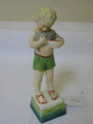 Appraisal: A ROYAL WORCESTER PORCELAIN FIGURE FRIDAYS CHILD modelled by Freda