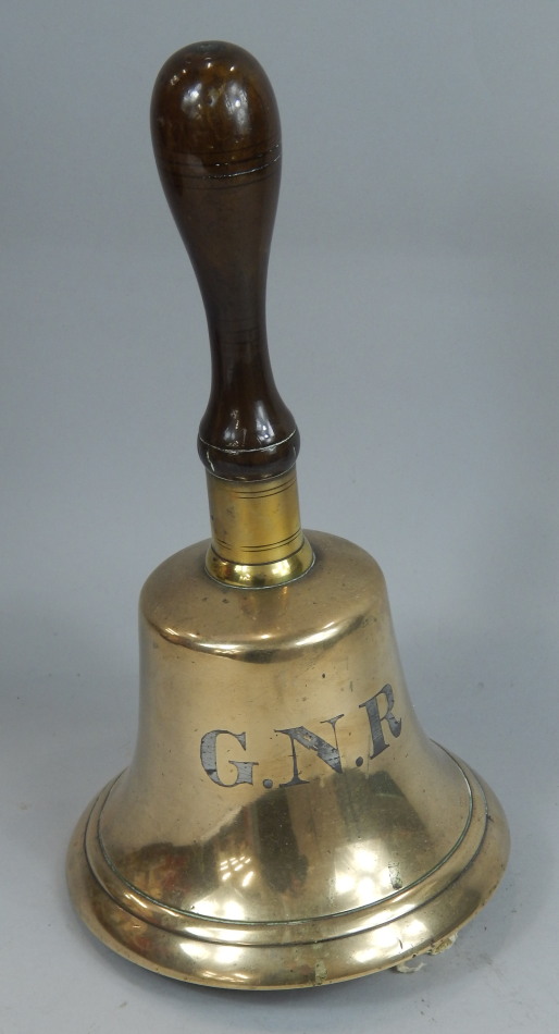 Appraisal: A late th early thC station bell with a turned