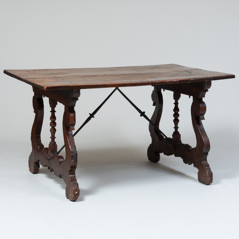 Appraisal: Spanish Baroque Chestnut and Wrought Iron Trestle Table x ft