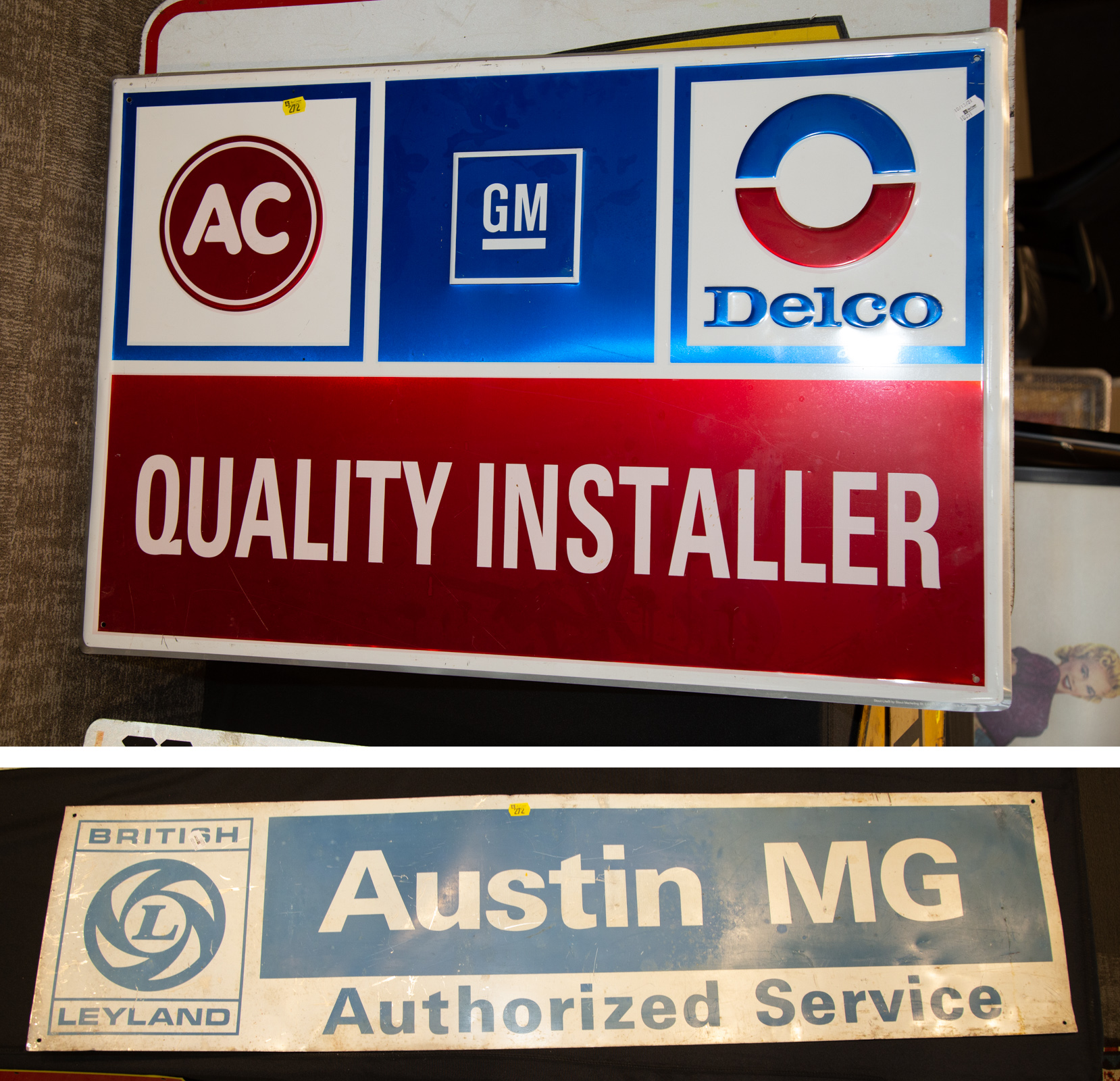 Appraisal: TWO AUTOMOTIVE PRINTED METAL SIGNS Includes Austin MG is in