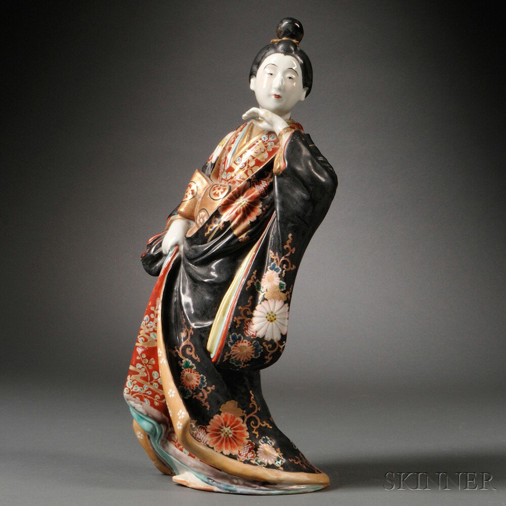 Appraisal: Porcelain Figure of a Geisha Japan dressed in a kimono