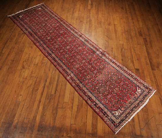 Appraisal: Hamadan Rug Contemporary Red ground with millefleur field within a