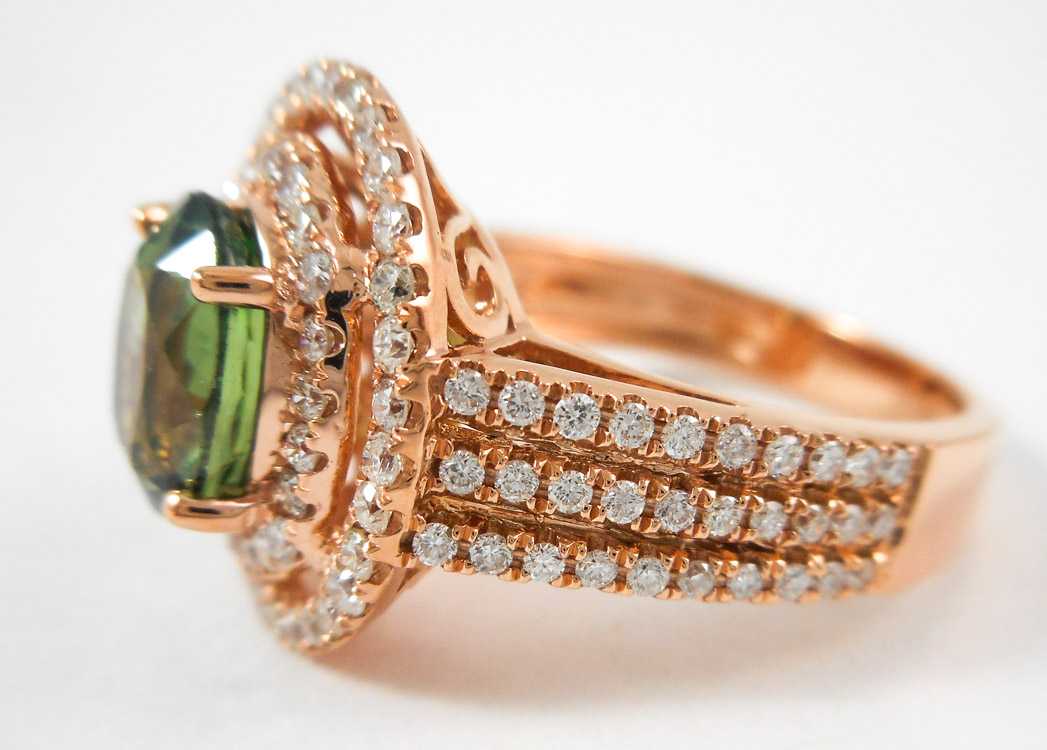 Appraisal: GREEN SAPPHIRE DIAMOND AND ROSE GOLD RING The k rose