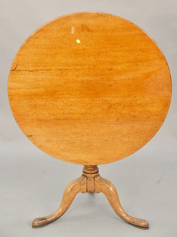 Appraisal: George III style mahogany tripod table circular top raised on