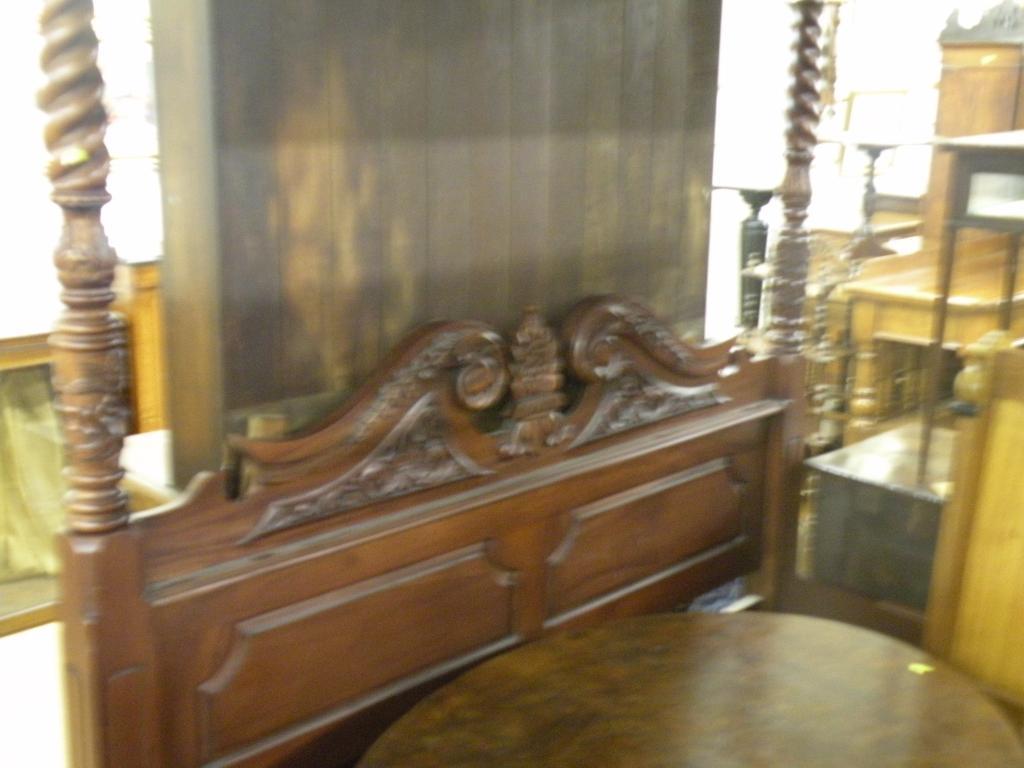 Appraisal: A Continental hardwood four poster bed in George III style