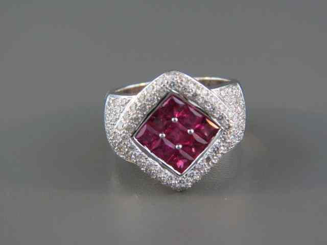 Appraisal: Ruby Diamond Ring round diamonds totaling carat and square rubies