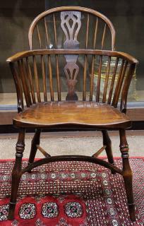 Appraisal: Windsor style bow back ash armchair circa having a plank