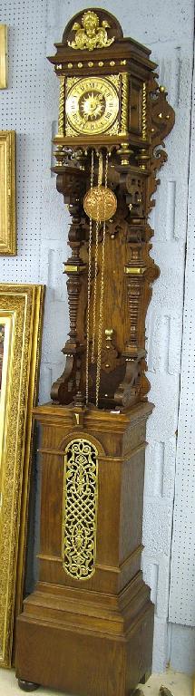 Appraisal: Dutch oak longcase Stoeltjesklok with wooden plate movement the brass