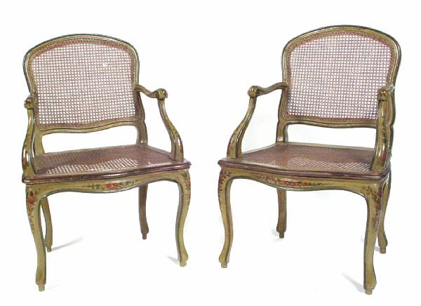 Appraisal: A pair of Venetian paint decorated and caned armchairs th