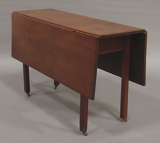 Appraisal: Oblong top with drop-leaf sides molded straight legs with scratch