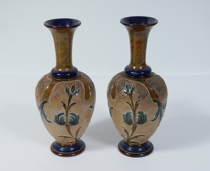 Appraisal: PR DOULTON LAMBETH EARTHENWARE VASES Incised decoration with foliate motifs