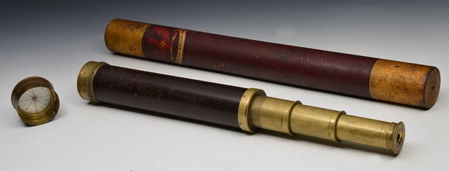 Appraisal: A DOLLOND LONDON THREE DRAWER BRASS TELESCOPE with mahogany grip