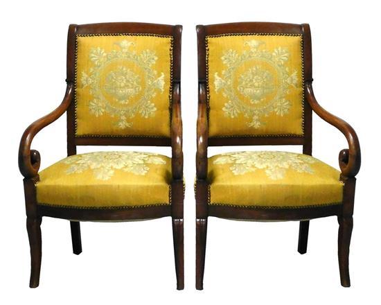 Appraisal: Pair of Charles X armchairs c scrolled arms gold upholstery