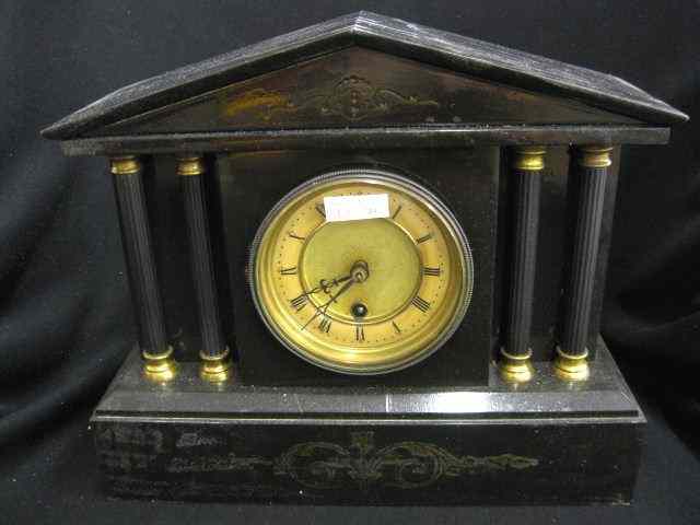 Appraisal: Victorian Mantle Clock cast iron case column decor '' tall