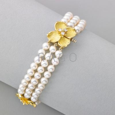 Appraisal: TIFFANY CO PEARL AND DIAMOND DOGWOOD BRACELET Triple strand cultured