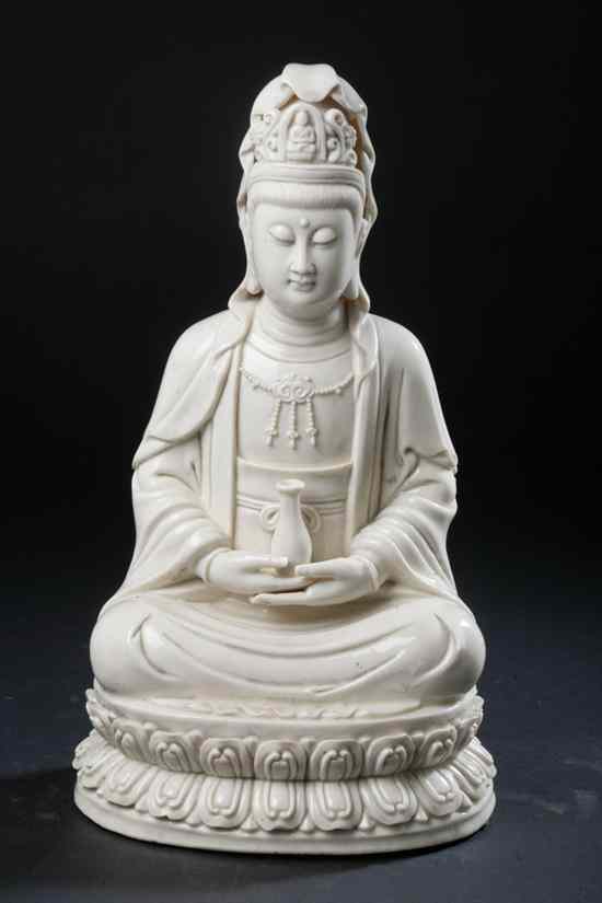 Appraisal: CHINESE BLANC-DE-CHINE PORCELAIN FIGURE OF GUANYIN Impressed maker's mark seated