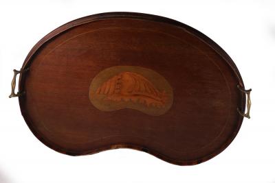 Appraisal: An Edwardian kidney-shaped tray with inlaid central shell patera and