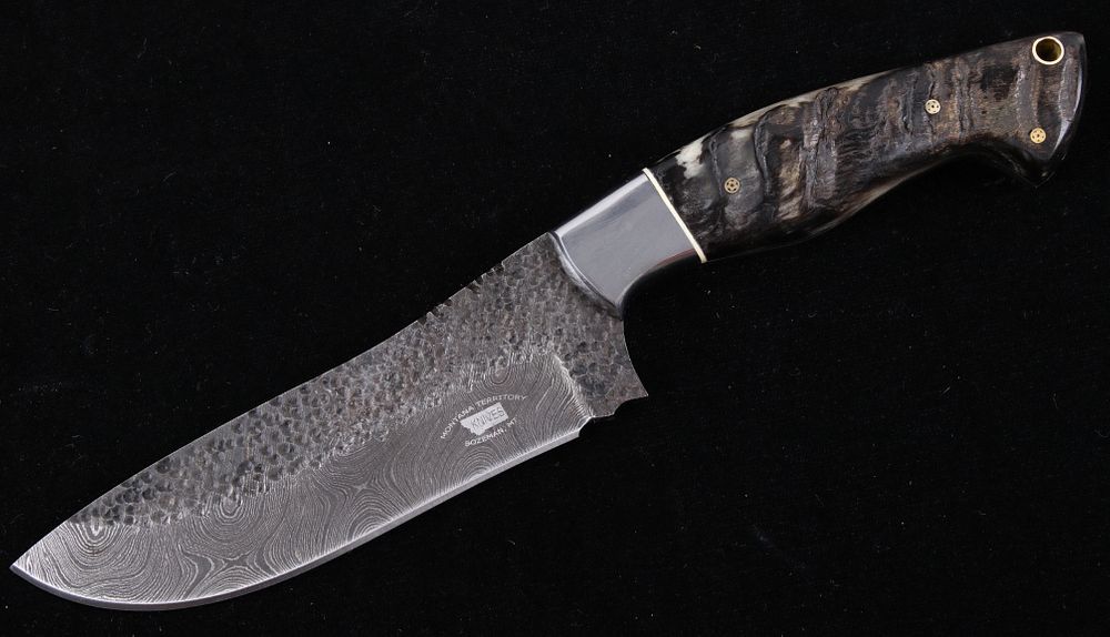 Appraisal: M T Knives Rams Horn Damascus Hammered Knife This is