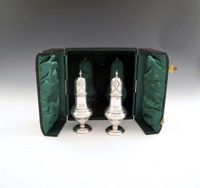 Appraisal: A pair of Edwardian silver sugar casters by Lister and