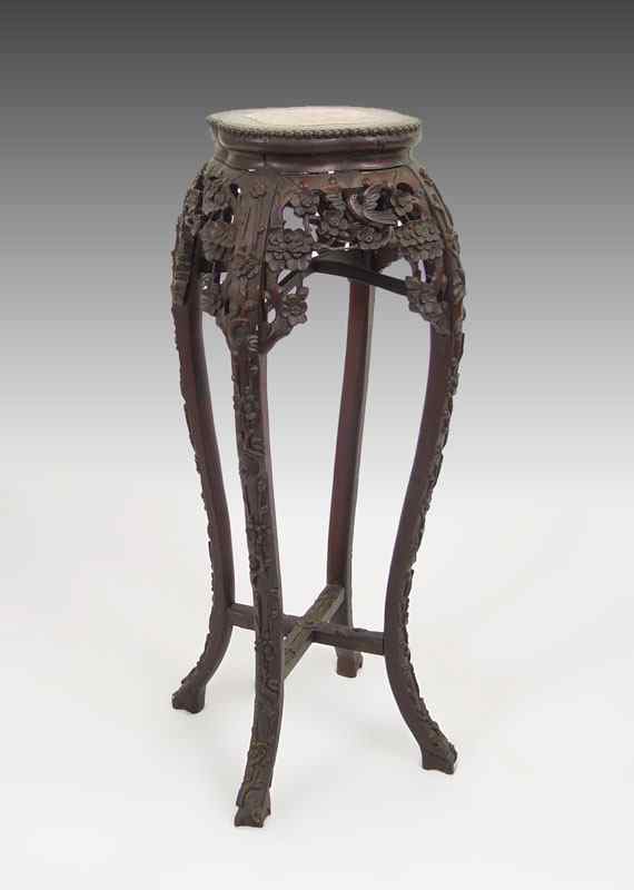 Appraisal: CHINESE CARVED FERN STAND Pierce carved wooden stand with ''