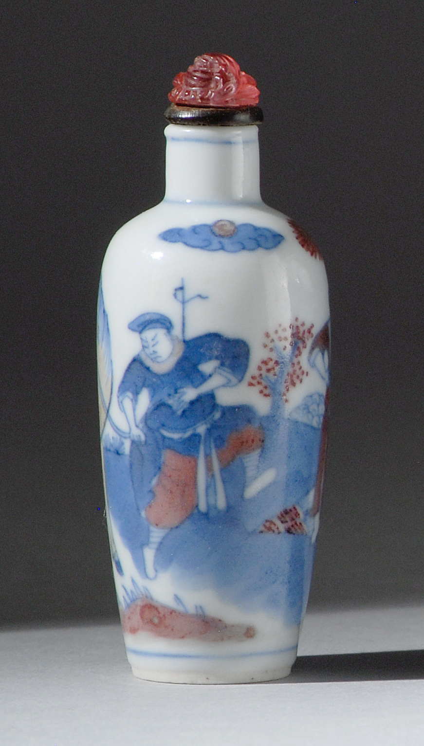 Appraisal: UNDERGLAZE RED AND BLUE PORCELAIN SNUFF BOTTLE th CenturyIn meiping