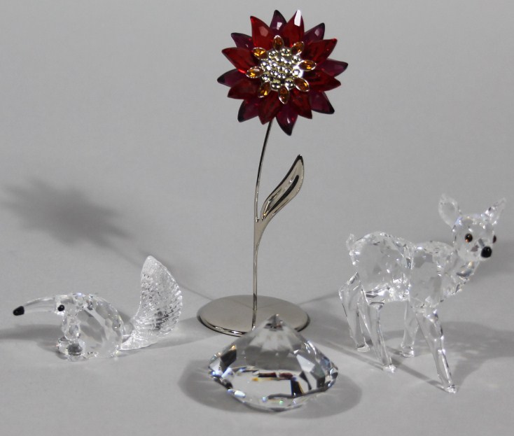 Appraisal: Various Swarovski crystal animals and groups to include fawn with