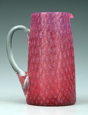 Appraisal: Cranberry glass tankard textured surface with opalescent highlights possibly Phoenix