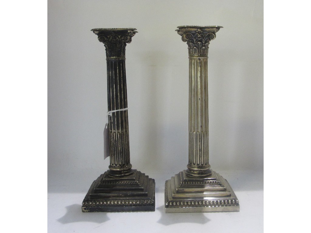 Appraisal: A pair of silver Corinthian column candl