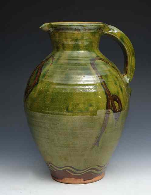 Appraisal: Clive Bowen British b A slipware jug made and fired