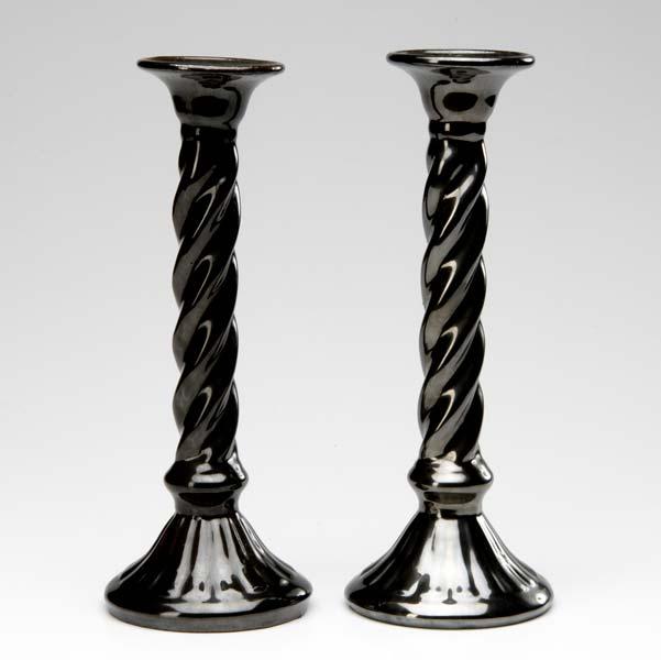 Appraisal: FULPER Pair of tall twisted candlesticks covered in mirrored black