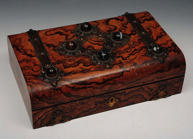 Appraisal: A VICTORIAN WALNUT BRASS BOUND AND AGATE INLAID GAMES BOX