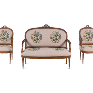 Appraisal: A Louis XVI Carved Walnut Seating Suite with Petit Point