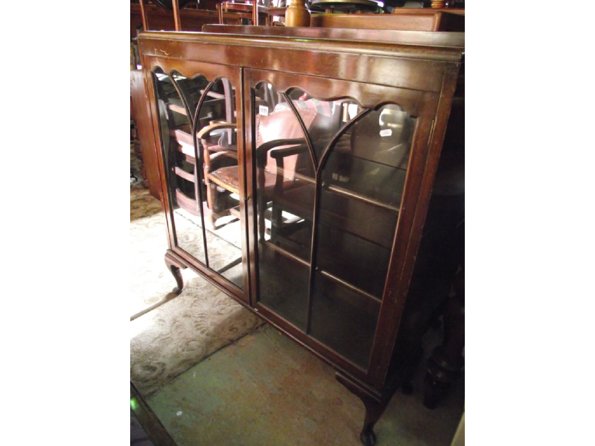 Appraisal: A s china display cabinet enclosed by two glazed panelled