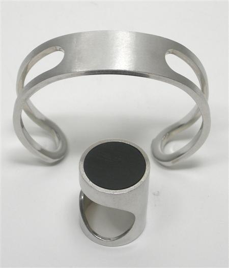 Appraisal: PIERRE CARDIN - a 's French silver bangle and similar