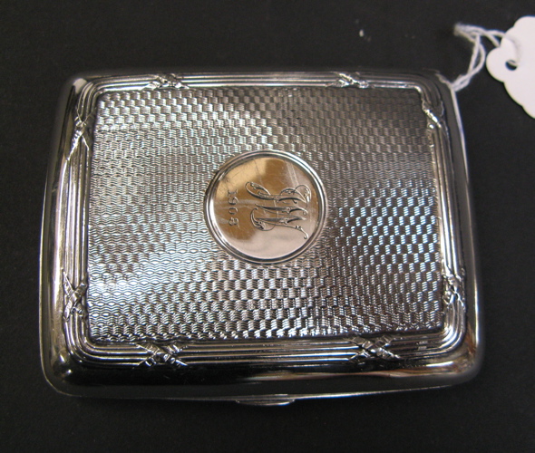 Appraisal: STERLING SILVER ENGLISH CIGARETTE CASE hand chased and engraved with