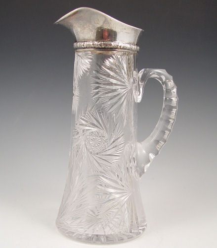 Appraisal: GORHAM STERLING MOUNTED CUT GLASS PITCHER Brilliant cut glass pitcher