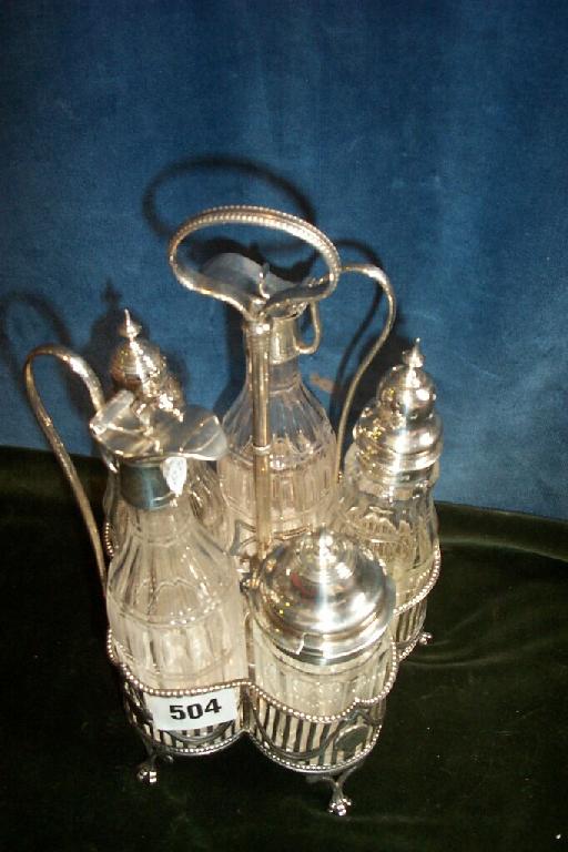 Appraisal: A -bottled cruet with pierced and beaded border fitted with