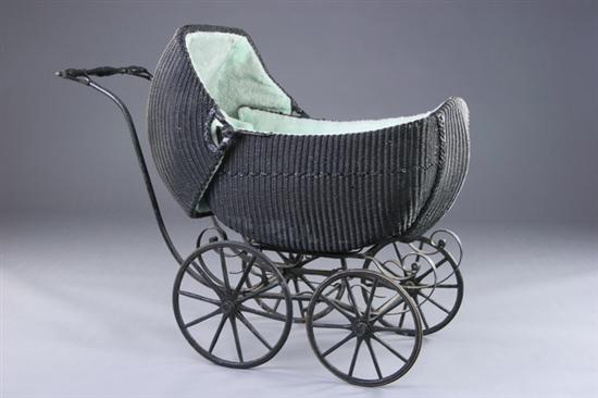 Appraisal: WICKER BABY CARRIAGE Woven wicker exterior metal frame with wooden