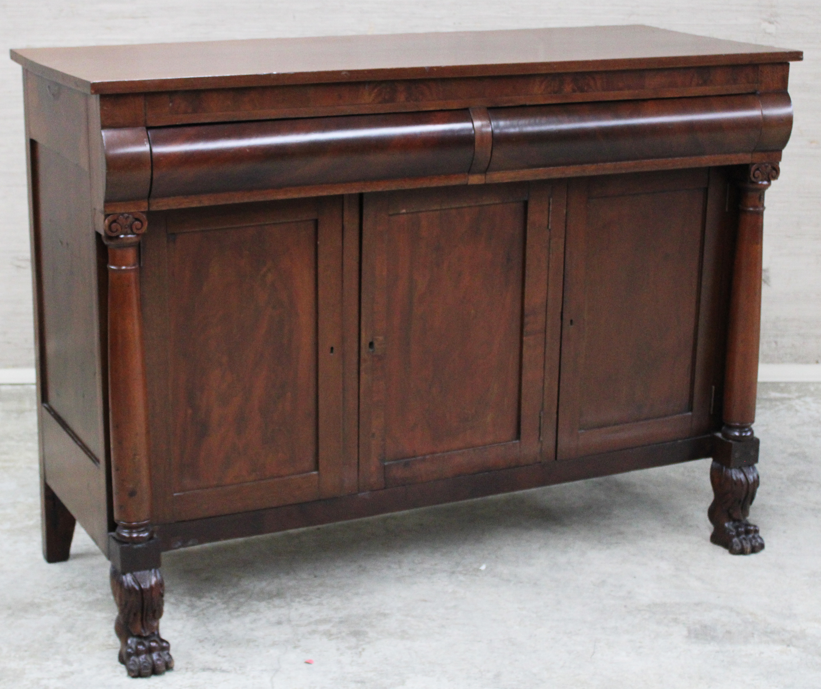 Appraisal: AMERICAN EMPIRE MAHOGANY SIDEBOARD TH C American Empire mahogany sideboard