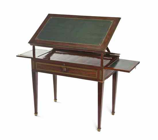 Appraisal: A Directoire Mahogany and Leather Inset Drafting Table having a