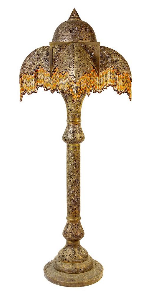 Appraisal: A Turkish or Egyptian Pierced Brass Floor Lamp Height inches