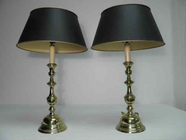 Appraisal: Pair of engraved brass baluster form candlestick lamps Each with