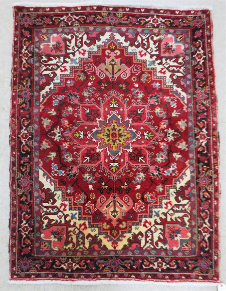 Appraisal: SEMI-ANTIQUE PERSIAN HERIZ AREA RUG hand knotted in a stylized