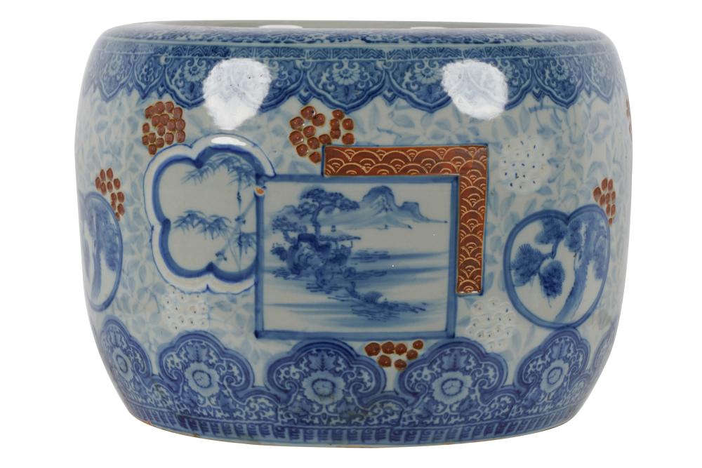 Appraisal: JAPANESE STYLE CERAMIC PLANTERunmarked decorated in blue white and rust