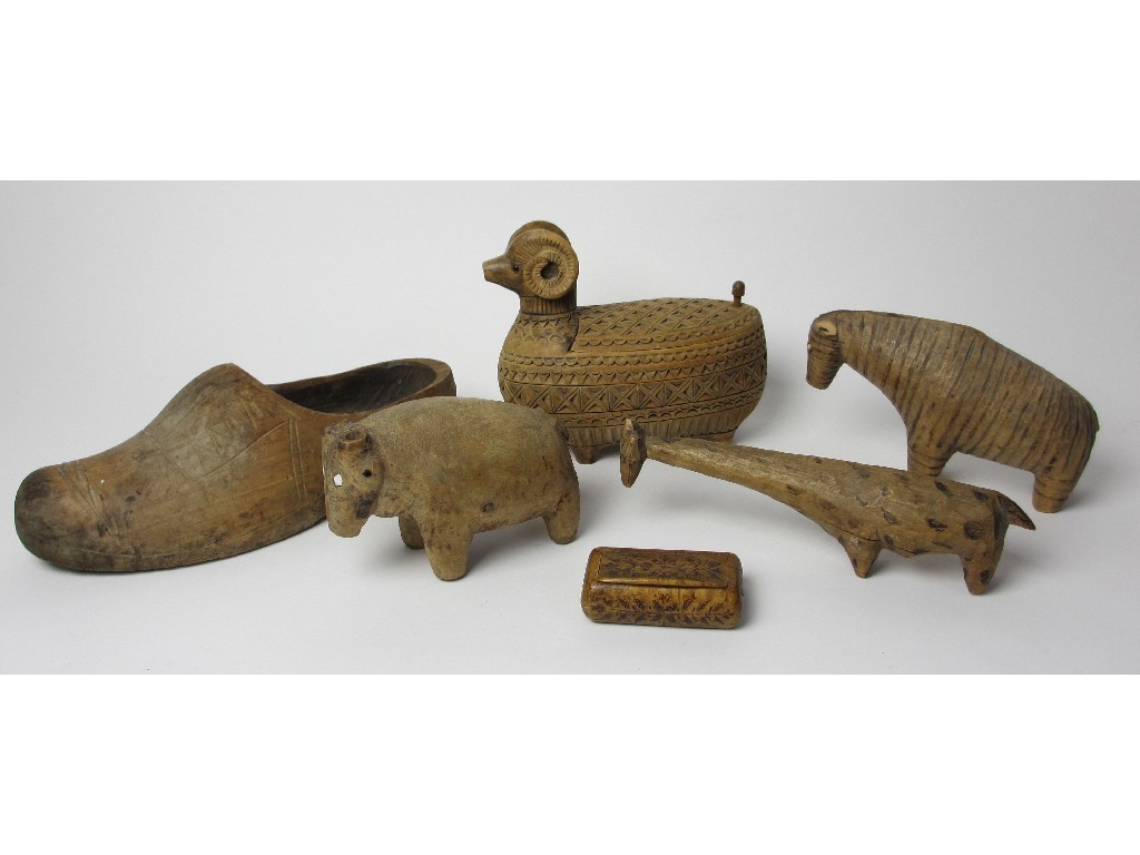 Appraisal: Four Russian carved treen toys clog and a snuff box