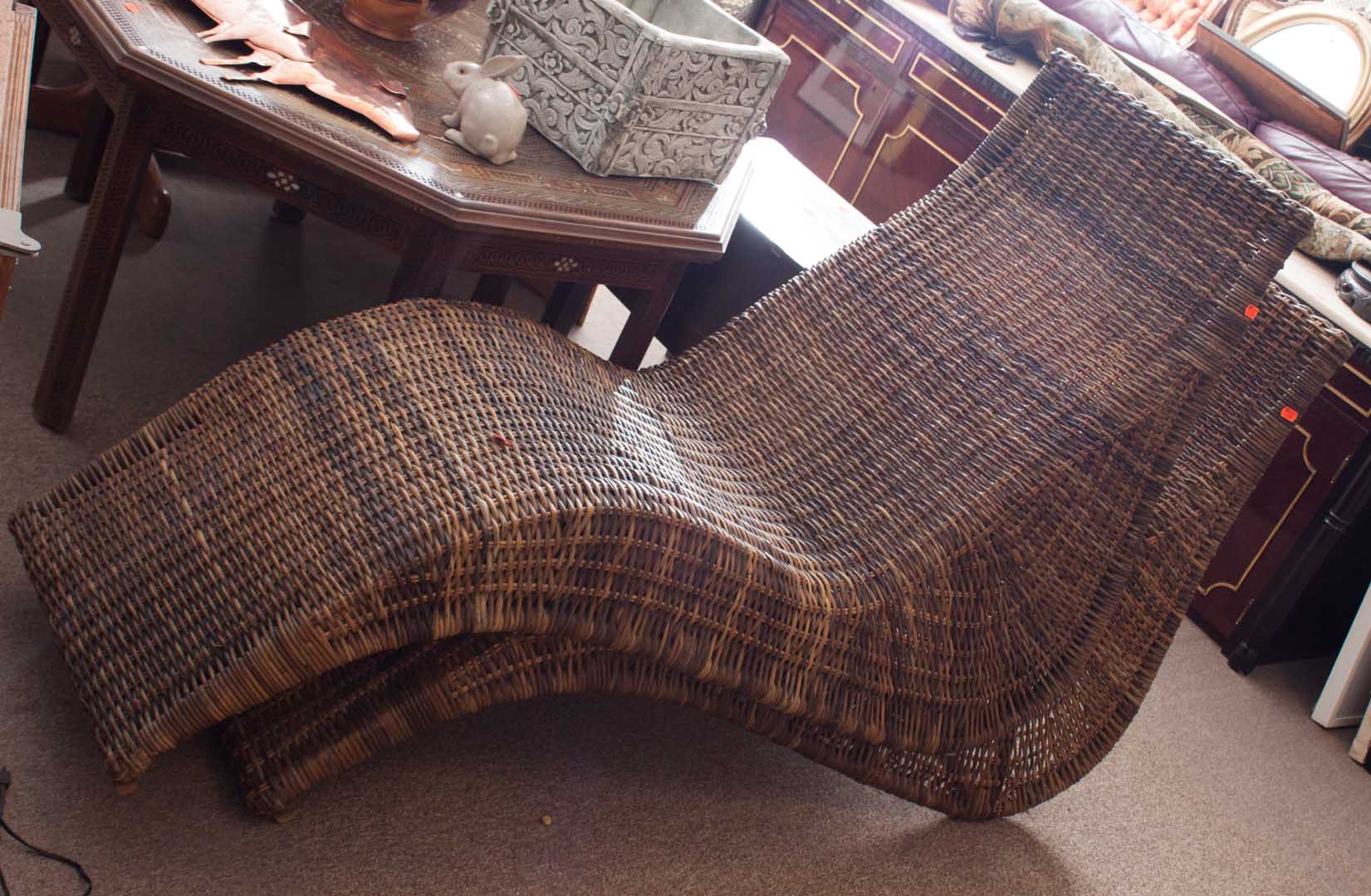 Appraisal: Pair of wicker lounge chairs