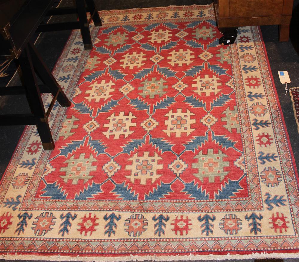 Appraisal: UZBEK KAZAK WOOL RUG having a geometric floral design on