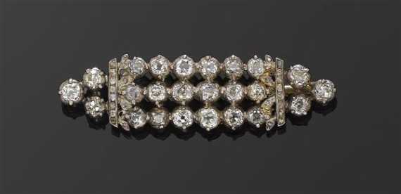 Appraisal: DIAMOND BROOCH s Silver Fancy bar brooch set with rows