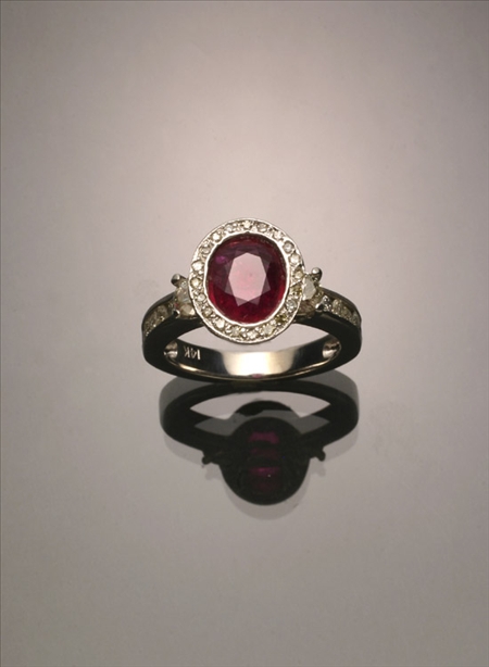 Appraisal: -Karat White-Gold Ruby and Diamond Dinner Ring The bezel mount