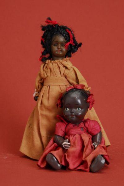 Appraisal: Lot Two Black Dolls Lot includes a German black child